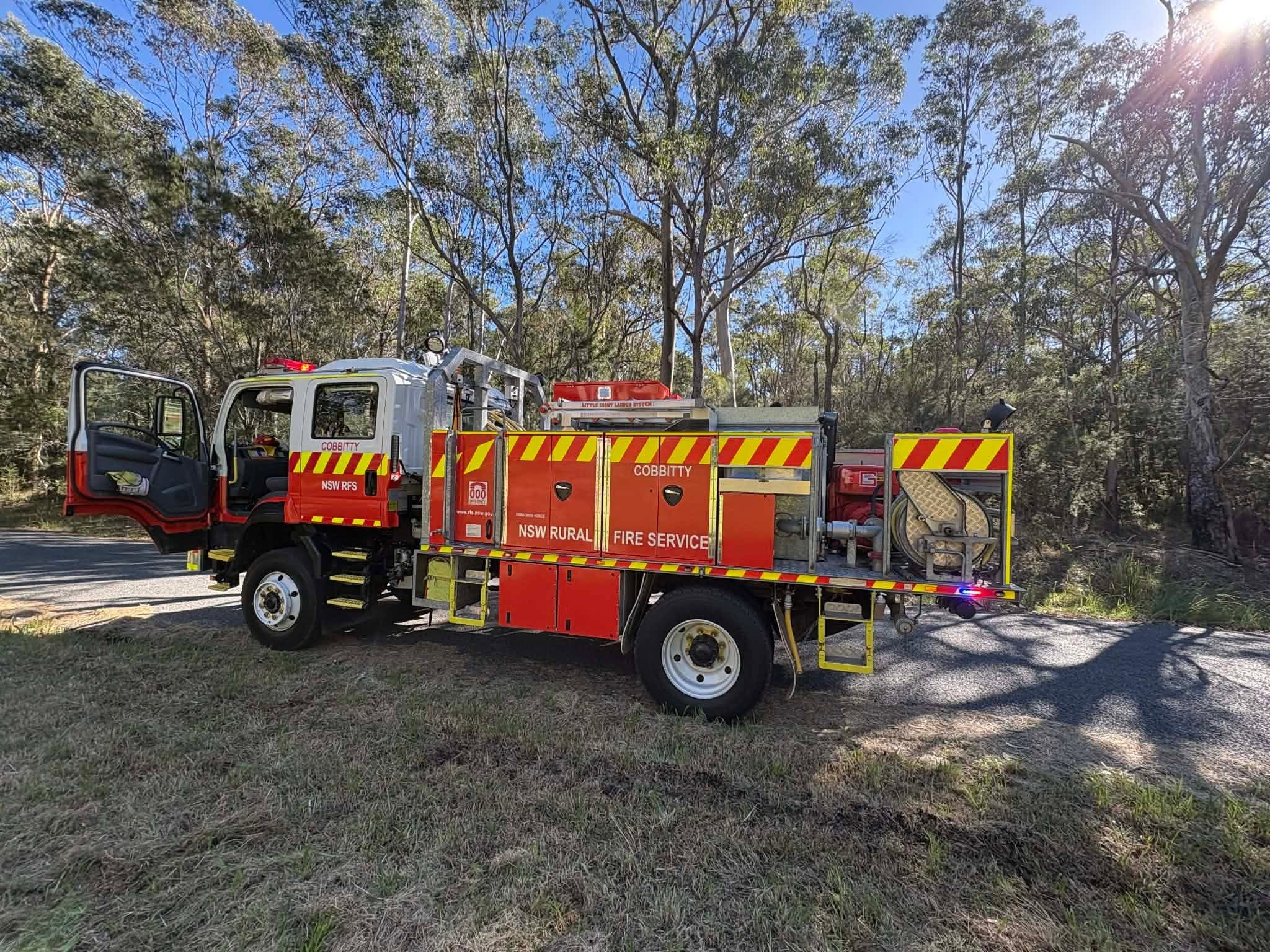 Cobbity RFS tanker parked in a paddock at sunrise